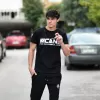 ΑΝΔΡΙΚΗ ΜΠΛΟΥΖΑ T-SHIRT ΛΑΙΜΟΣ ΛΟΓΟΤΥΠΟ MOHICANS MCNS08.ΜΑΥΡΟ